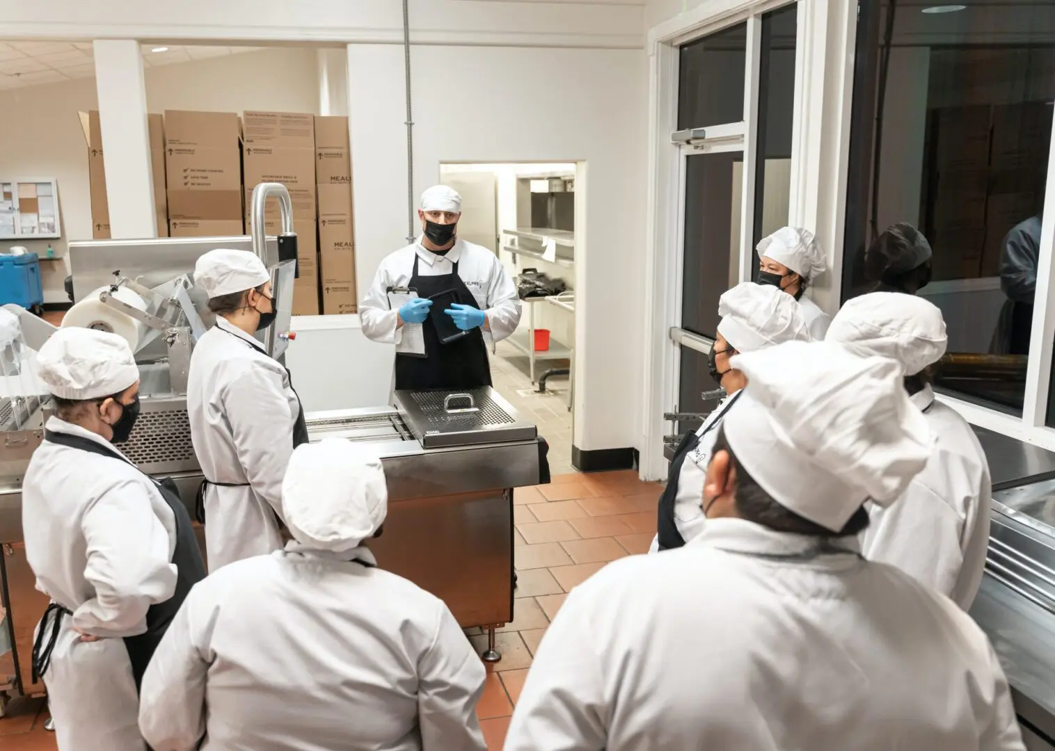 A Group of Chefs Working in a Kitchen